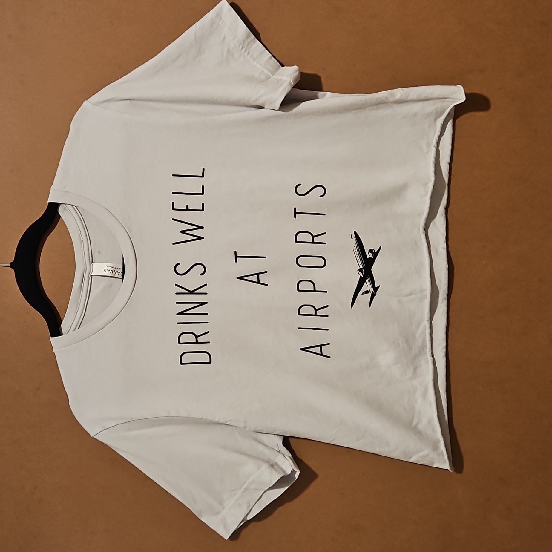 'Drinks Well At Airports' Light Gray Graphic Crop Tee Lg. Airline Humor Sarcasm